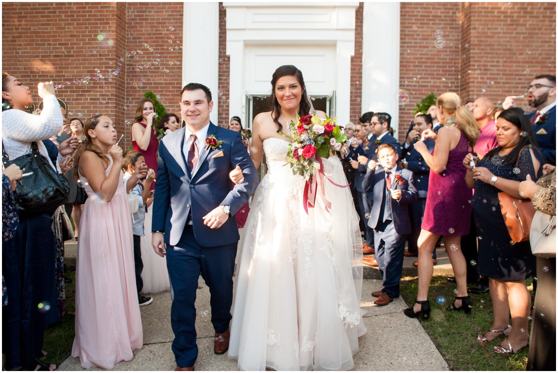 Eastern Shore wedding couple leaves church to bubble shower Melissa Grimes-Guy Photography