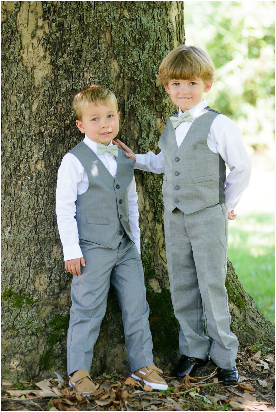 Little ring bearers in grey suits at a wedding at The Oaks by Melissa Grimes-Guy Photography