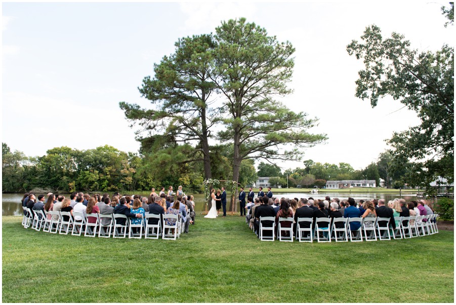 Wedding ceremony at The Oaks Waterfront Inn in St. Michaels, MD by Melissa Grimes-Guy Photography